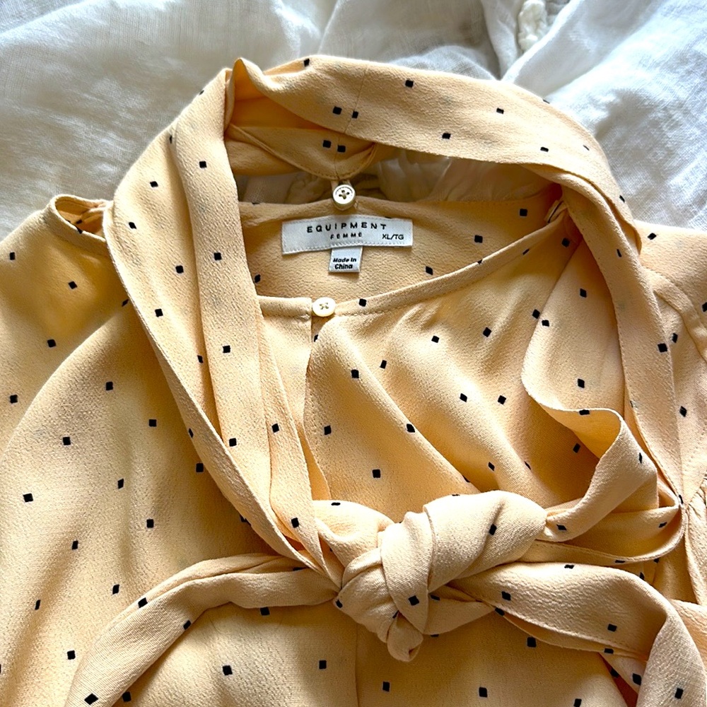 New with tags. Extra large equipment blouse. Pleated billowy sleeves. Dressy